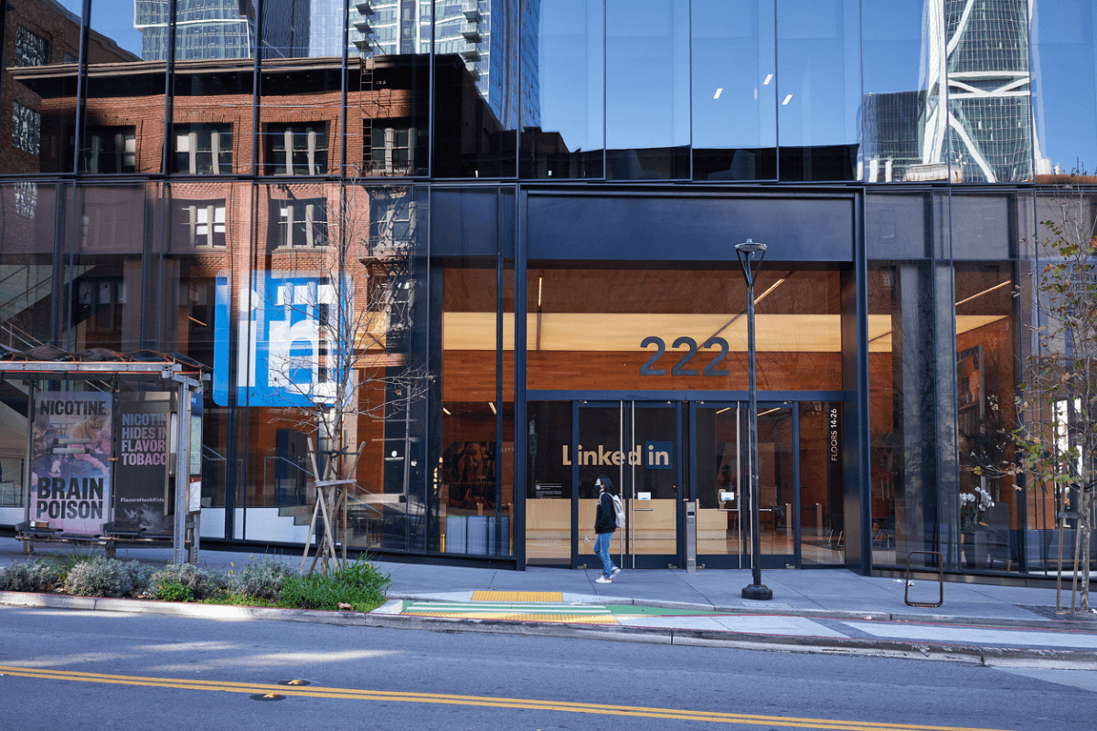 Facade of modern, glass LinkedIn office building.