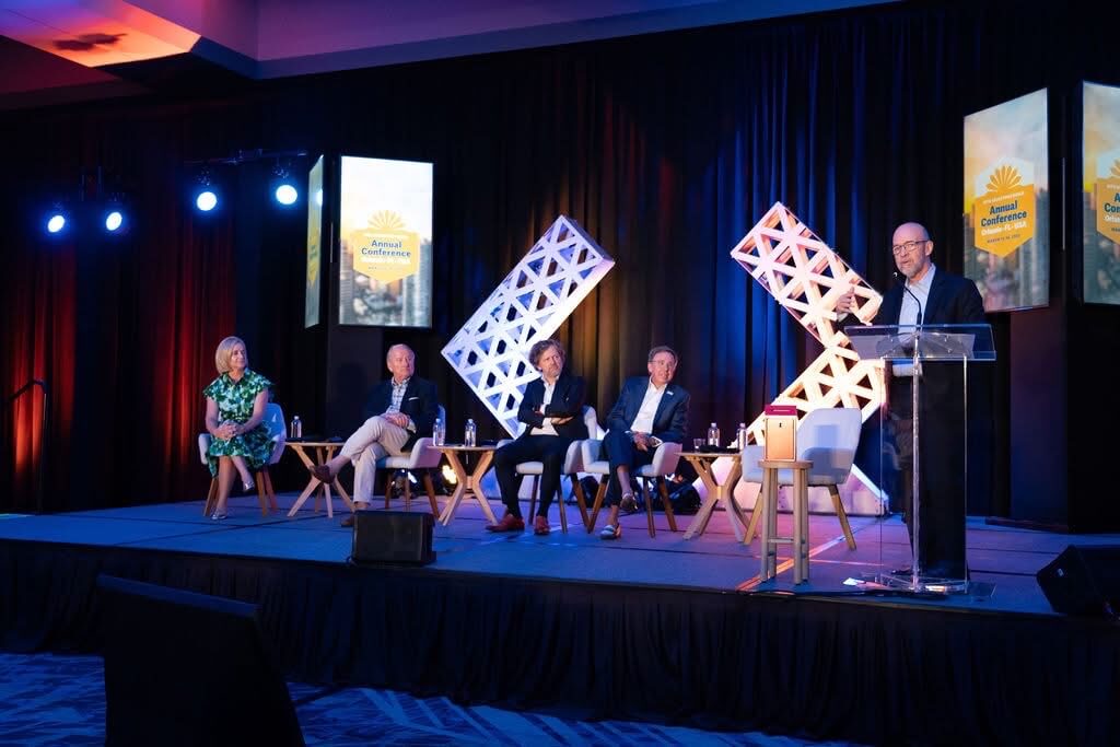 Andy Levine moderating a panel at the site selectors guild annual conference 2025