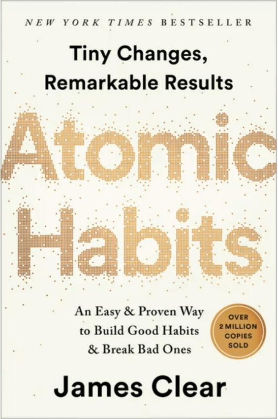 Gold, tan and black book cover of Atomic Habits