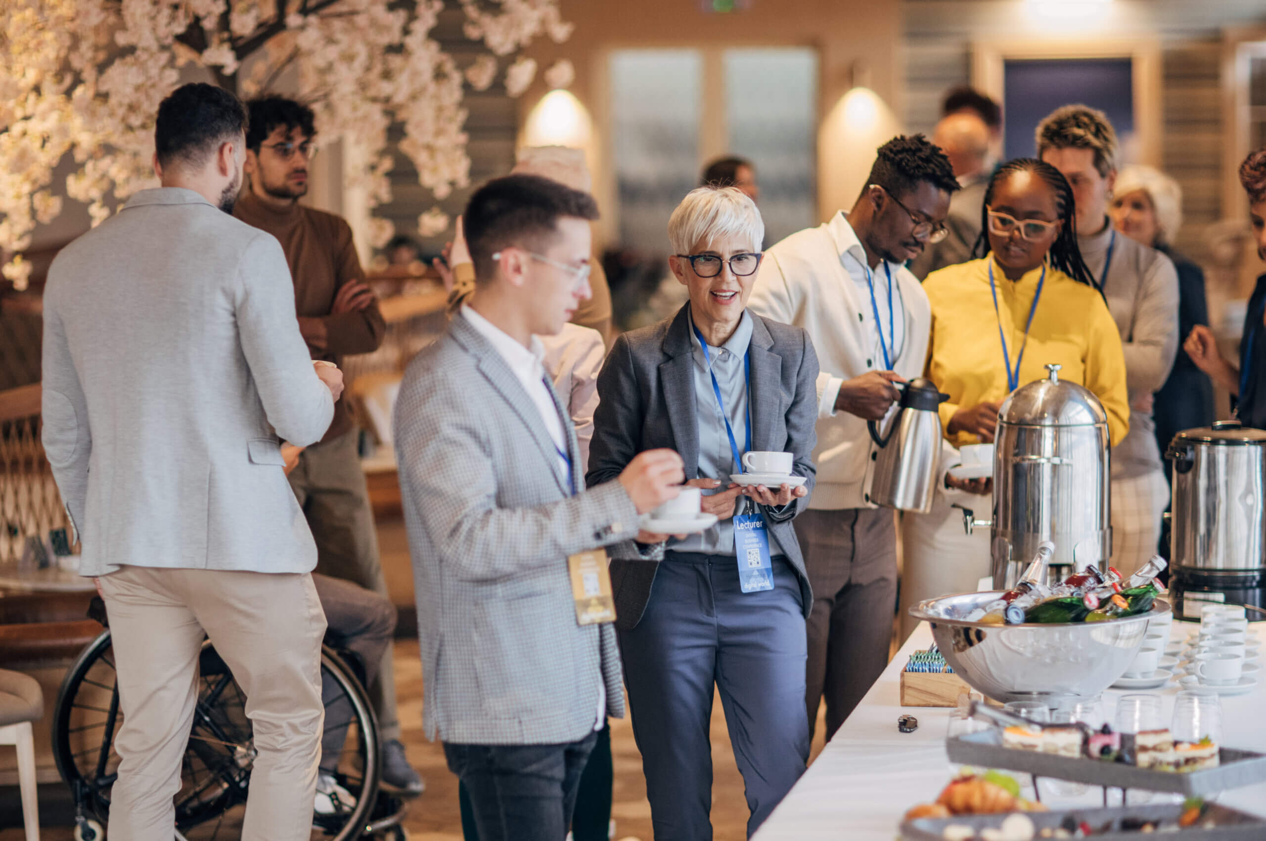 Group of meeting planners eating at a business event.